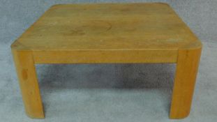 A contemporary oak low table. H.18 W.86 D.86cm