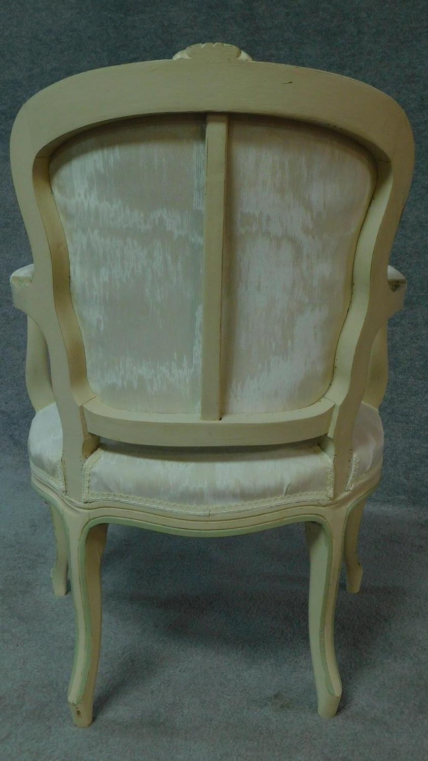 A carved and painted fauteuil in ivory damask on cabriole supports. H.86cm - Image 9 of 9