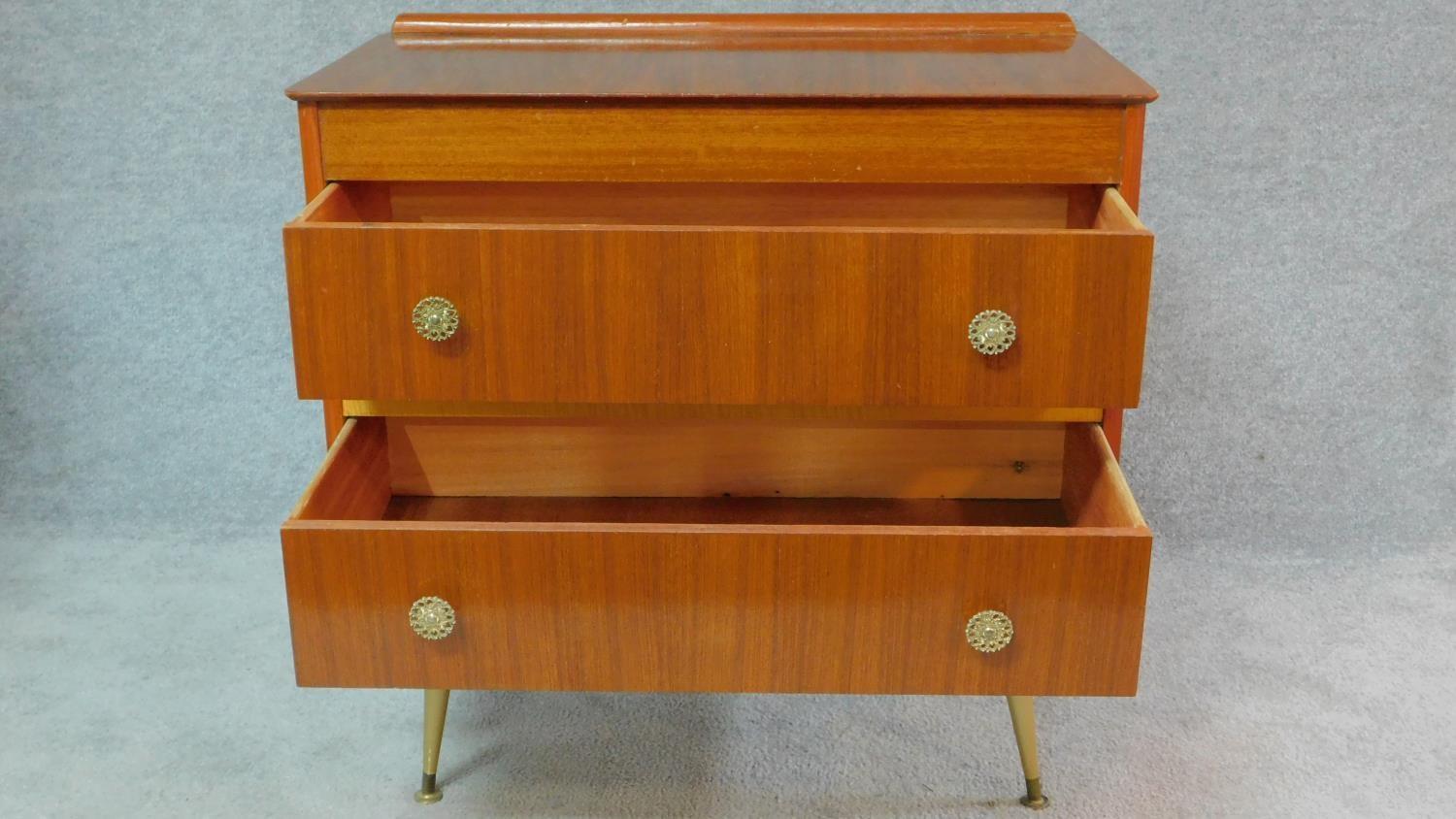 A vintage 1960's teak and satin birch inlaid chest of two long drawers on sputnik style supports. - Image 3 of 6