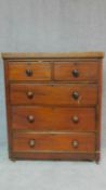 A Victorian mahogany chest of two short over three long drawers. H.111 W.97 D.46cm