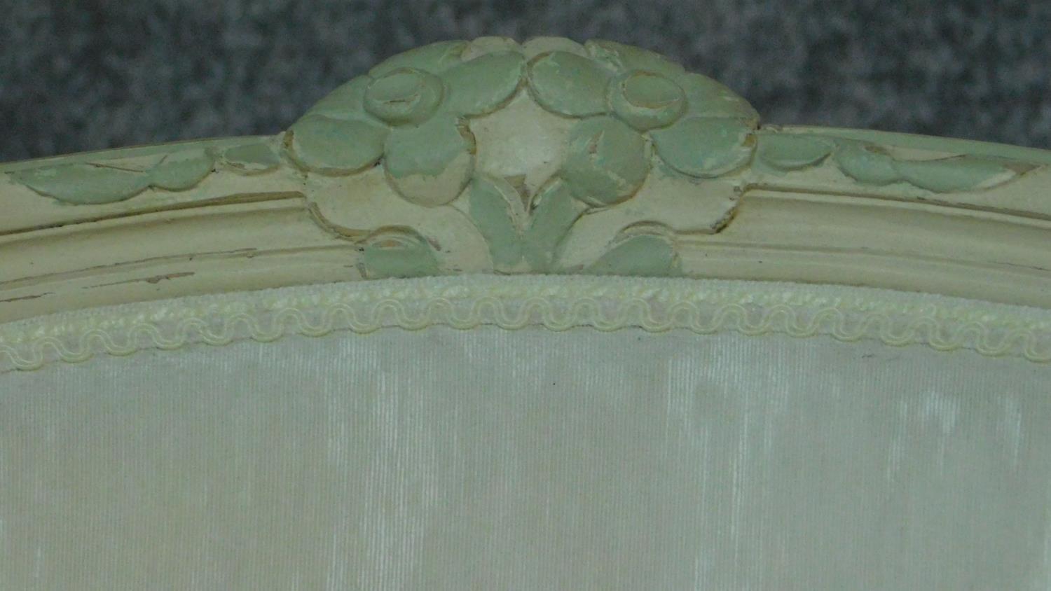 A carved and painted fauteuil in ivory damask on cabriole supports. H.86cm - Image 3 of 9