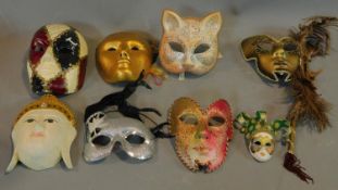 A collection of eight Venetian and other masks.