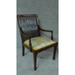 An Edwardian mahogany inlaid armchair on square tapering supports H.94cm