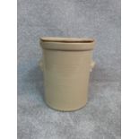 A stoneware bread bin with wooden bread board cover. H 36m