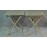 A pair of metal and ceramic tiled folding garden tables. H.74 W.63 D.63cm