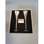 A pair of silver plated Links of London Champagne flutes in box, with authenticity card. Stamped