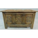 A small carved oak Jacobean style coffer. H.46 W.77 D.40cm