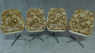 Four Vintage swivel chairs in floral print. H.85cm
