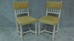 A pair of late 19th century French painted side chairs in studded and buttoned Dijon mustard