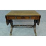 A small Regency style mahogany drop flap sofa table. H.53 W.114 D.51cm