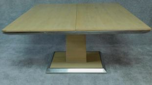 A modern square topped draw leaf table. H.79 W.193 D.140cm (missing leaves)