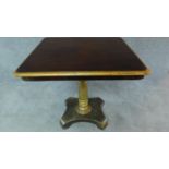 An early 19th century tilt top table with gilt highlighted top and central pedestal. H.74 W.73 D.