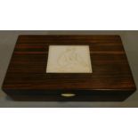 An Art Deco rosewood jewellery box with signed inlaid panel of a girl with a dove. H.5 W.19 D.11cm