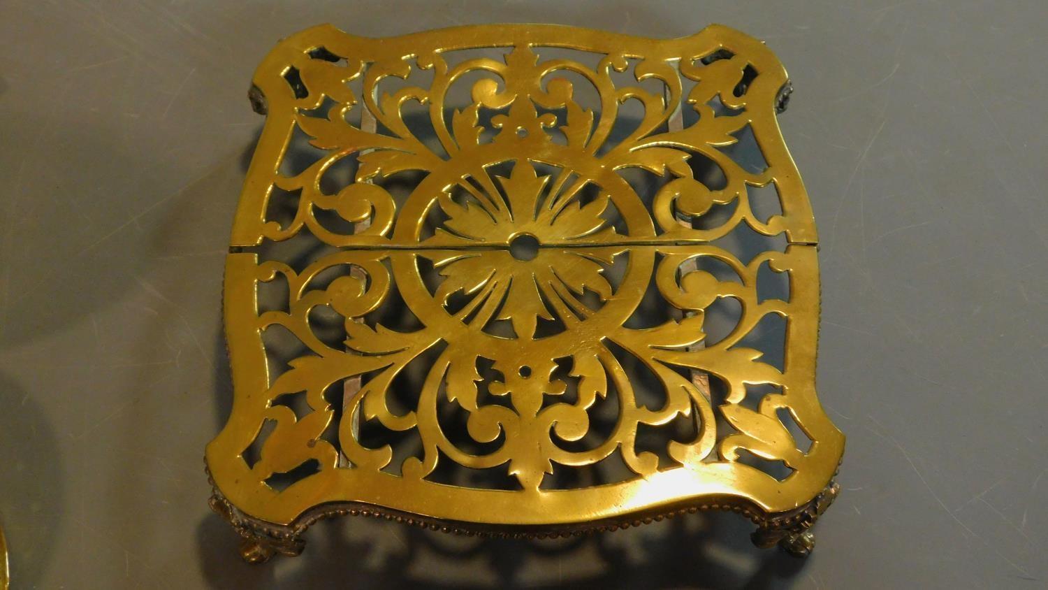 Two 19th century brass lidded strainers and a brass trivet. W.58 (widest) - Image 6 of 6