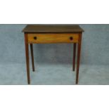 A Georgian mahogany single drawer side table on square section supports. H.74 W.76 D.50cm