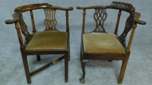 A Georgian carved mahogany corner chair and another similar (missing one cross stretcher) H.81cm