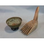 Tribal wooden foot and Indian brass bowl, brass bowl with repousse animal design and wooden stand