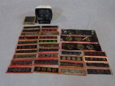 A collection of antique magic lantern slides, glass photographic plates and a Halina photography