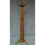 A late 19th century oak coatstand on tripod platform base. H.204cm