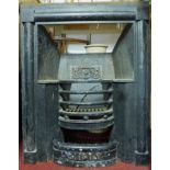 A 19th century cast iron fire insert. H.96 W.78cm