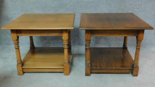 A pair of antique style country oak side tables on turned supports united by undertier. H.50 W.61
