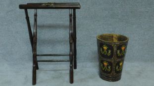 A stand for a butler's tray with bamboo form legs and brass handles and a hand painted Barge ware