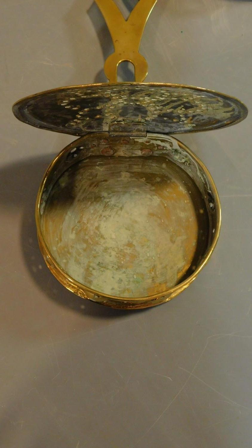 Two 19th century brass lidded strainers and a brass trivet. W.58 (widest) - Image 5 of 6