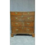 A Georgian country oak chest of two short over three long drawers on bracket feet. H.108 W.96 D.49cm