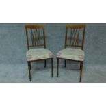 A pair of mahogany inlaid side chairs by Maple and Co. London and Paris. H.88cm
