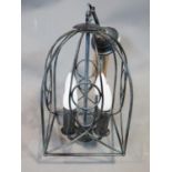 A birdcage ceiling light pendant with antique finish. H 48 cm