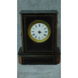 A late 19th century ebonised, brass and marble inlaid mantle clock. H.33cm (lacks glass and hands)