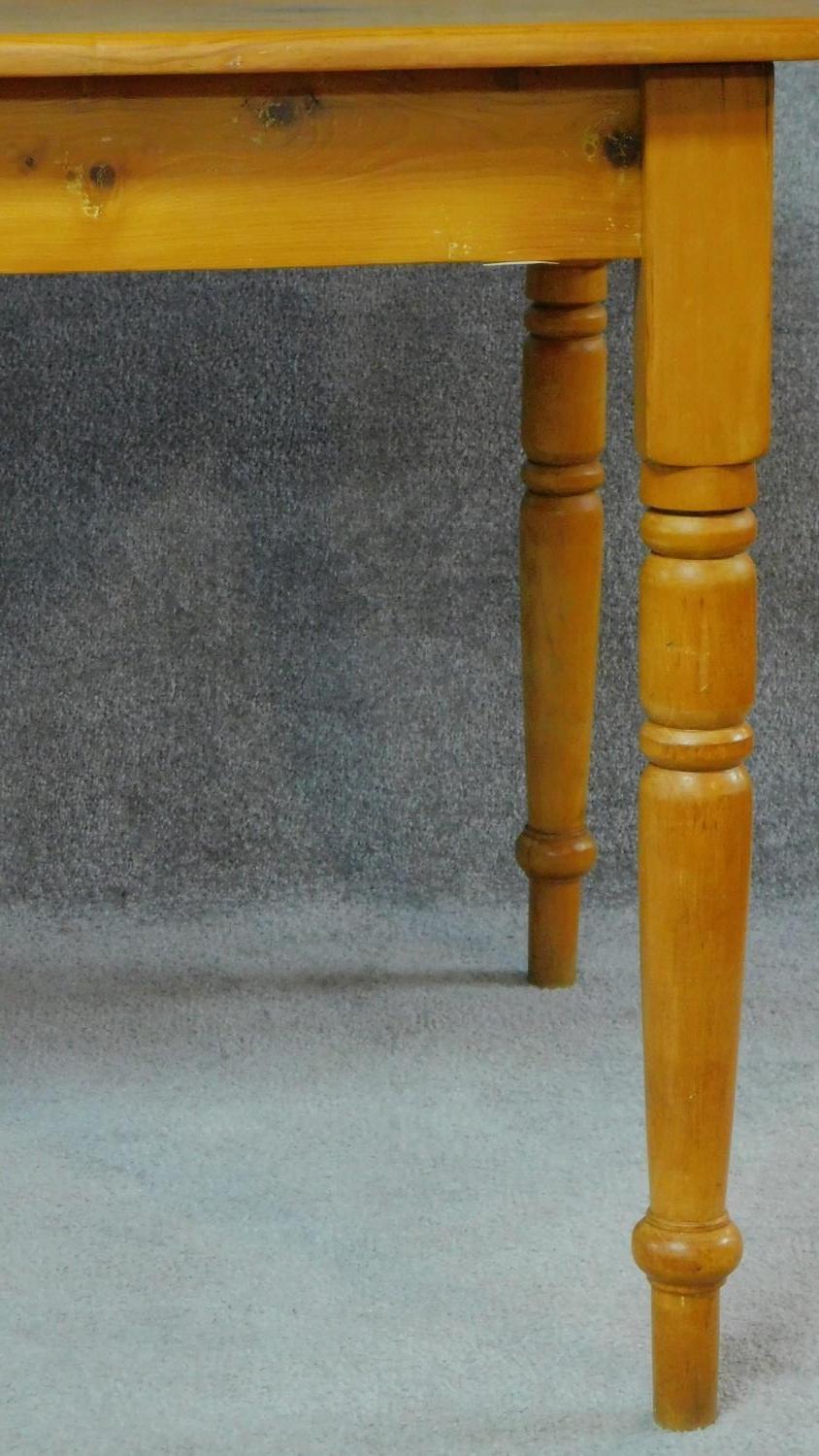 A 19th century pine/Yellowwood planked top refectory dining table on turned tapering supports. - Image 2 of 4