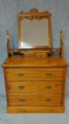 A late Victorian satin walnut dressing chest. H.122 W.92 D.51cm (original mirror but fixings