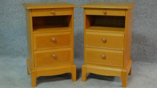 A pair of G Plan bedside cabinets fitted with pull out slides to the frieze. H.65 W.40 D.31cm