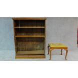 An oak open bookcase and a Georgian style stool. H.122 W.97 D.31cm (bookcase)