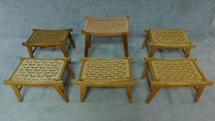 A collection of six beech framed stools with woven drop in seats H.48 (tallest)