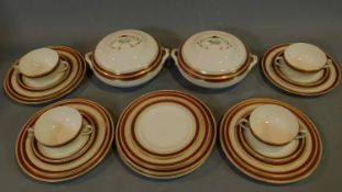 A Loselware part dinner service, dinner plates, side plates, soup bowls, tureens etc.