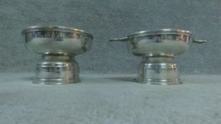 A pair of engraved quaich cups on stands, engraved 'PAMADA 2002, the sign award, sponsored by Icon