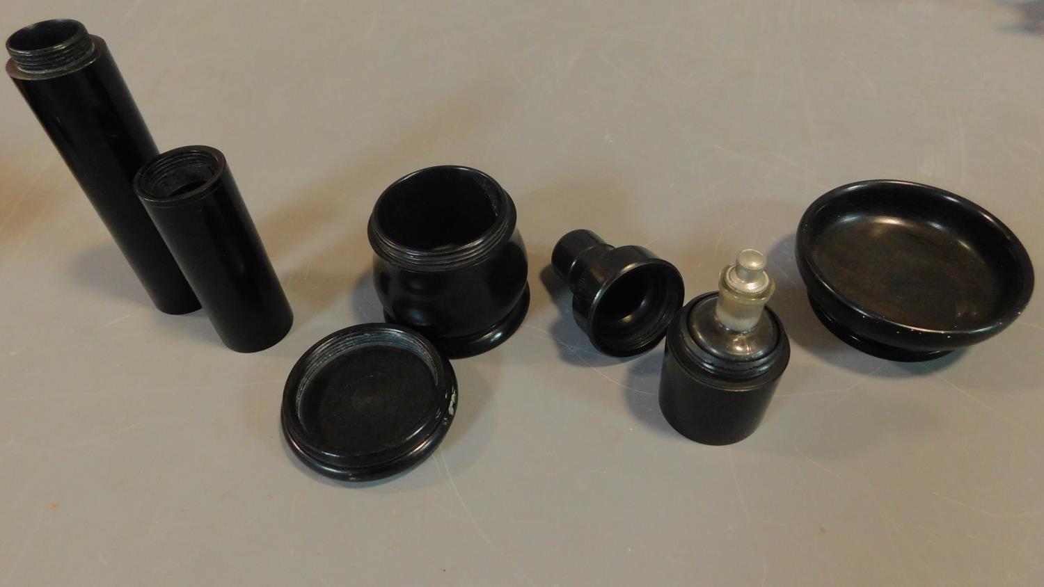 A collection of 19th century turned ebony dressing table pieces. - Image 3 of 6