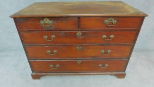 A Georgian mahogany chest of two short over three long drawers on bracket feet. H.87cm W.116cm D.