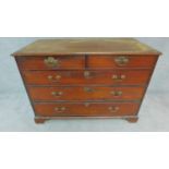 A Georgian mahogany chest of two short over three long drawers on bracket feet. H.87cm W.116cm D.