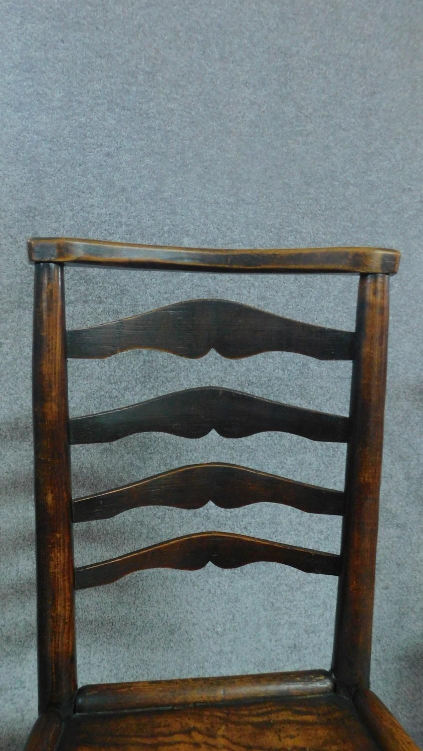 A 19th century elm ladderback dining chair and an elm seated Windsor wheelback chair. H.93cm - Image 3 of 7