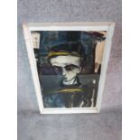 A framed and glazed oil on paper, abstract face, labelled Mario Minski. 74 x 53cm