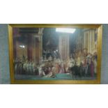 A large gilt framed and glazed print of a royal coronation. H.98 W.147