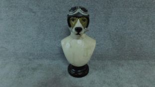 A moulded and polychrome bust of a vintage style canine racer. H.49cm