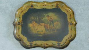 An Victorian hand painted papier mache tray with reclining ladies and two males in attendance.