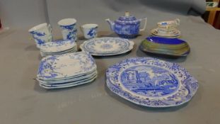 A blue and white porcelain tea set and an art pottery dish