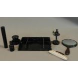 A collection of 19th century turned ebony dressing table pieces.