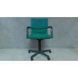A Vitra swivel and adjustable office desk chair, label to underside. H.103cm