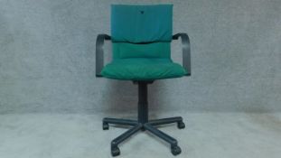 A Vitra swivel and adjustable office desk chair, label to underside. H.103cm